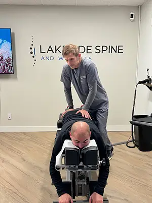 Chiropractor Renton WA Andy Winger Adjusting Patient